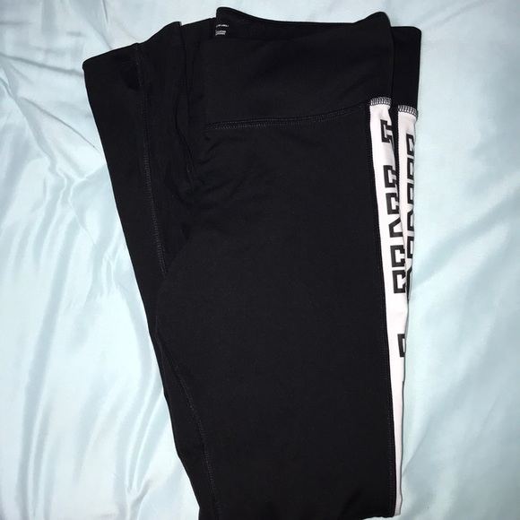 black leggings with white stripe down the side